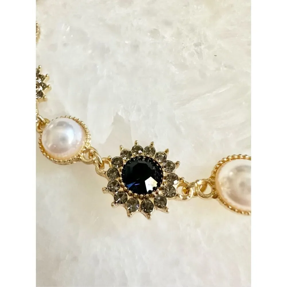 Dark blue sapphire rhinestone with gold chain-link with pearl regal style bracel